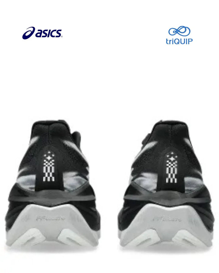 A pair of black and gray Asics Superblast 3 running shoes shown from the back, featuring a white pixelated logo on the heel and a thick white sole, set against a plain white background with Asics and triQUIP logos at the top.