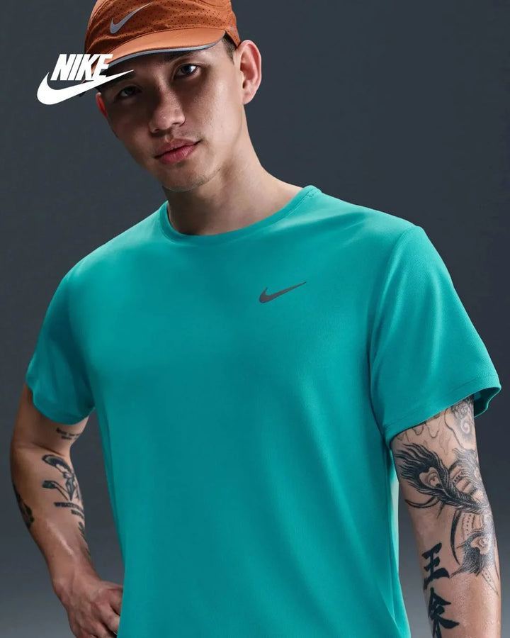 NIKE Dri-FIT UV Miler Men's Short-Sleeve Running Top on triQUIP Sports