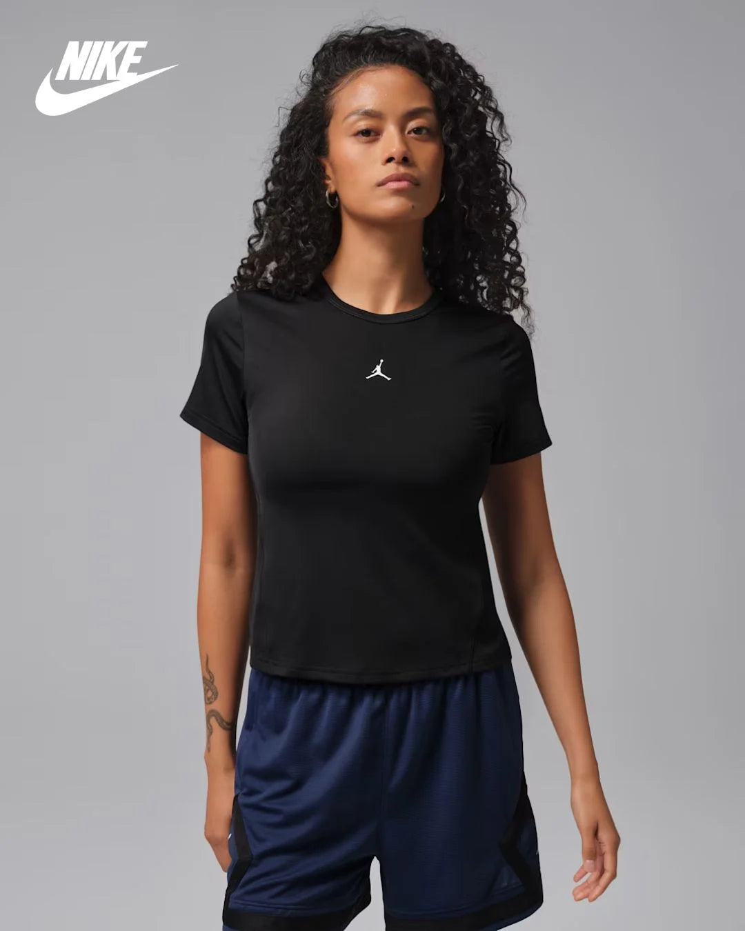 NIKE Jordon Sport Essentials Women Dri-FIT Short Sleeve Top on triQUIP Sports