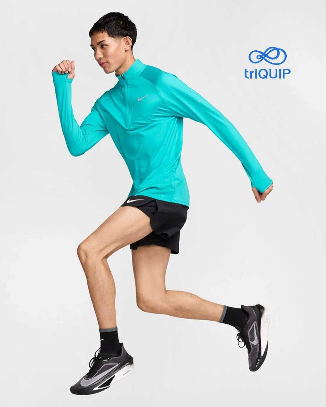 NIKE Stride Men's Dri-FIT 1/4-Zip Running Top on triQUIP Sports