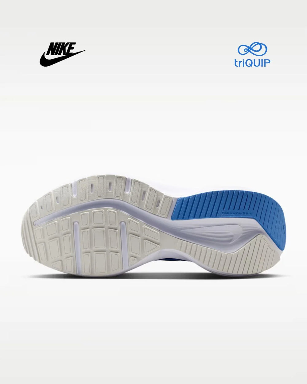 A Nike running shoe sole shown from the bottom, featuring a white and light gray textured tread with a bright blue heel section. The Nike swoosh is visible in the top left, and the triQUIP logo is visible in the top right, all on a clean white background.