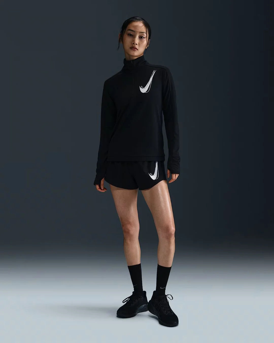 NIKE Swoosh Women's Dri-FIT 1/2-Zip Running Mid Layer on triQUIP sports